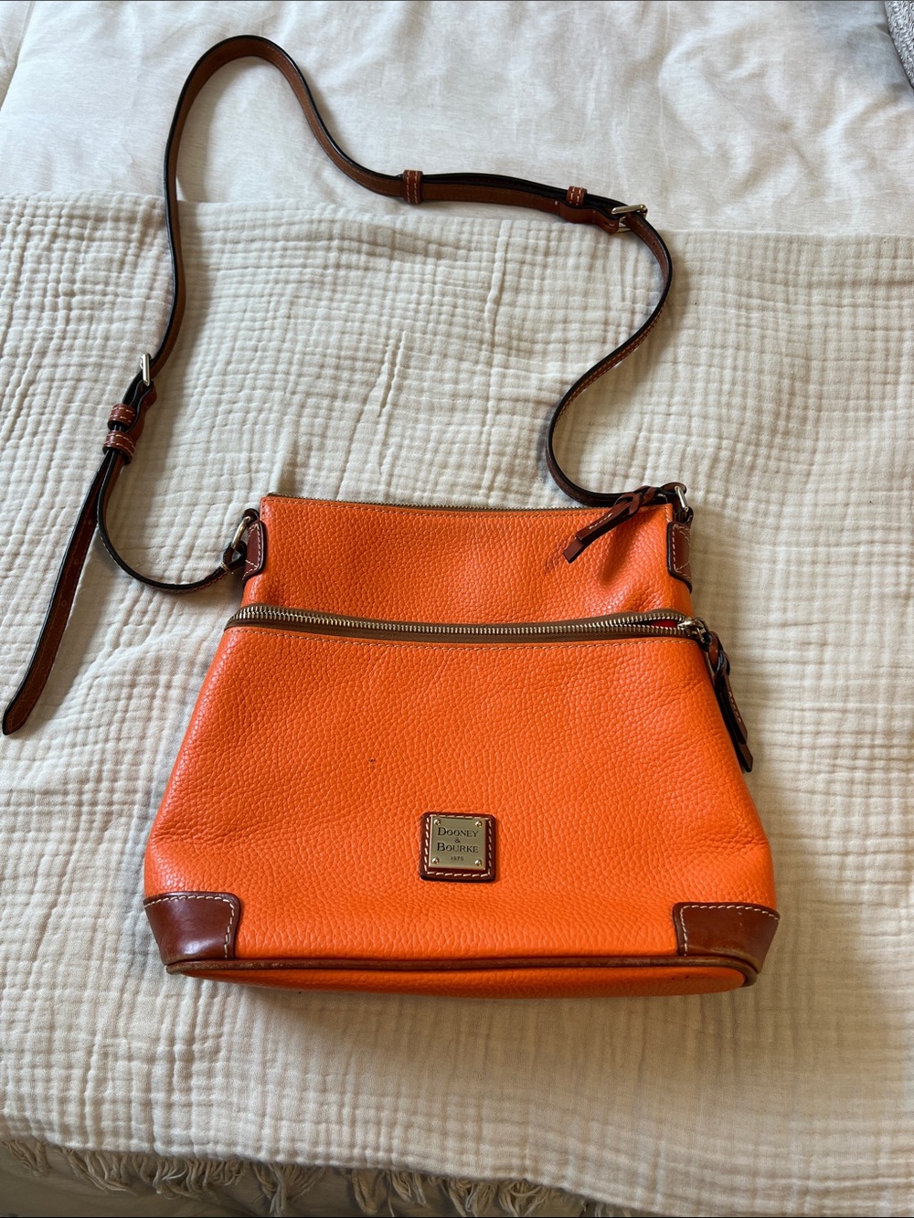 Dooney & Bourke Orange Pebbled Leather Crossbody with Brown Trim